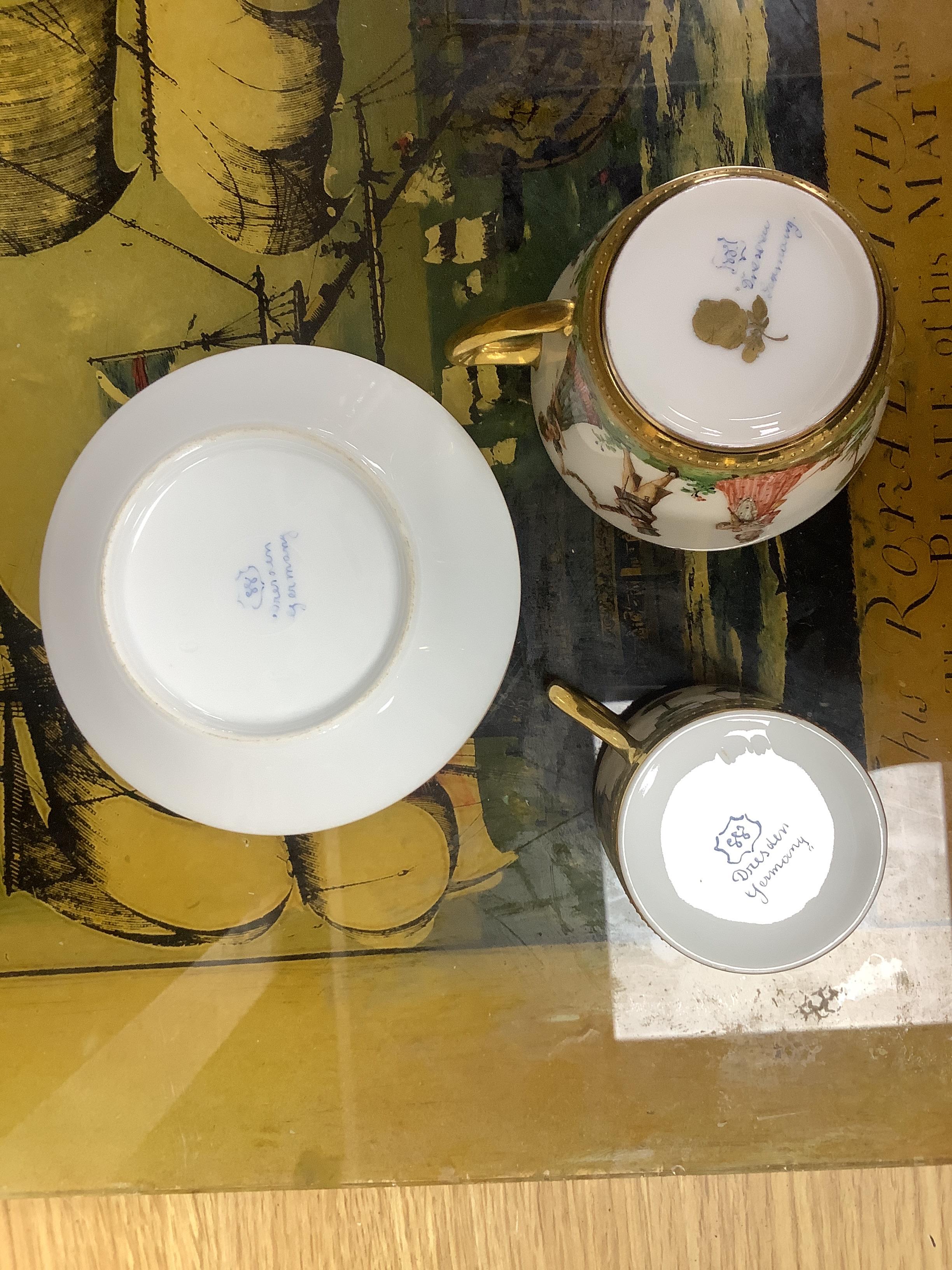 A group of European porcelain tableware to include a pair of figures, Lowestoft jug, Dresden cups etc.